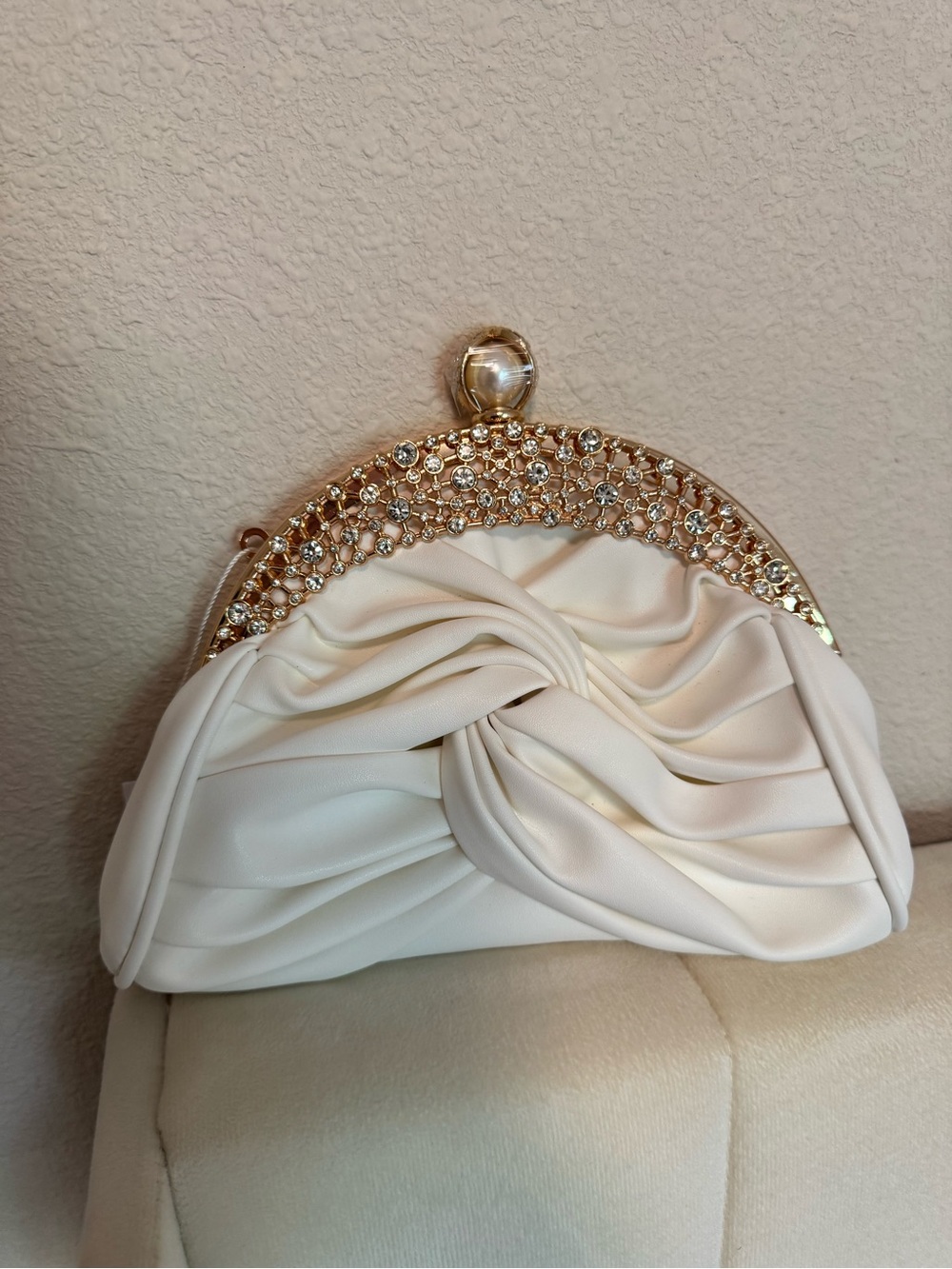 Diamond studded white clutch 
Evening bag